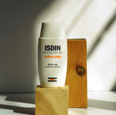 ضدآفتاب ضدلک بی رنگی اکتیو یونیفای ایزدین FotoUltra 100 SPF 50